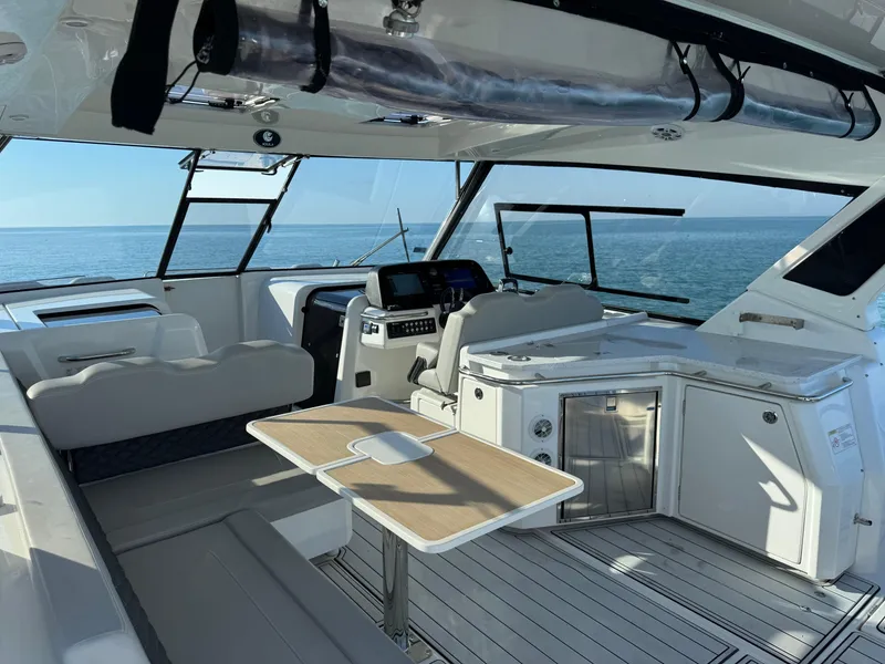Slide: The Image of Interior of 2019 Aquila 36 Sport yacht with modern seating and ocean view. - 37