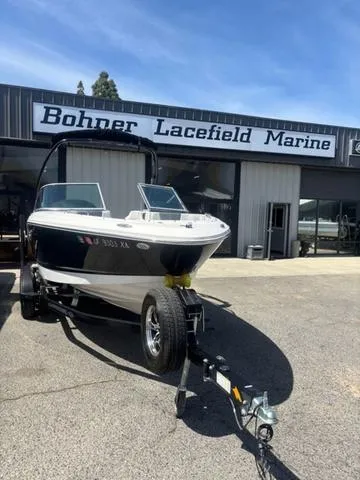 Slide: The Image of 2021 Chaparral 21 SSi boat on trailer at Bohner Lacefield Marine dealership. - 2