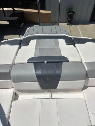 Slide: The Image of 2021 Chaparral 21 SSi boat interior with gray and white seating. - 5