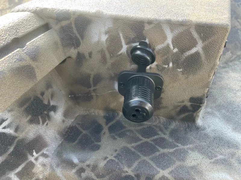 Slide: The Image of Power socket on 2025 Excel 1751 River Warrior boat with camouflage pattern. - 19