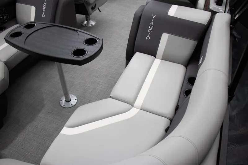 Slide: The Image of Luxurious seating in 2025 Viaggio Lago X-U boat with sleek design and cup holders. - 10