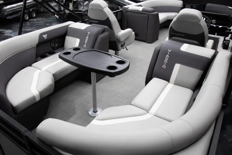 Slide: The Image of Luxurious 2025 Viaggio Lago X-U boat interior with plush seating and table. - 12