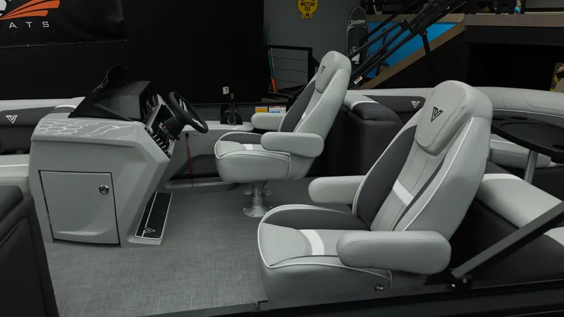 Slide: The Image of 2025 Viaggio Lago X-U boat interior with modern seating and sleek dashboard design. - 16