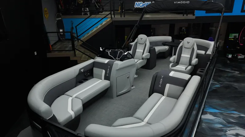 Slide: The Image of 2025 Viaggio Lago X-U boat interior with sleek gray seating and modern design. - 19