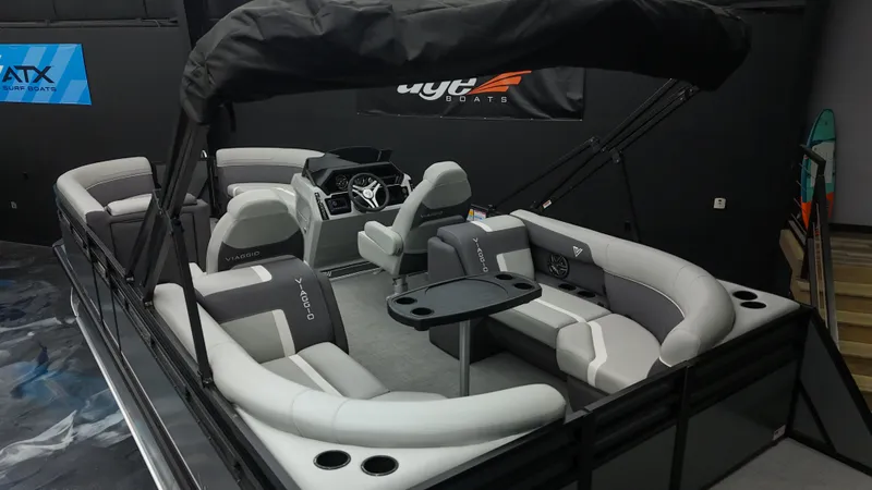 Slide: The Image of 2025 Viaggio Lago X-U pontoon boat with modern seating and canopy. - 26