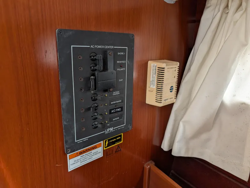 Slide: The Image of Control panel on a 2003 Beneteau Oceanis 473 sailboat interior. - 22