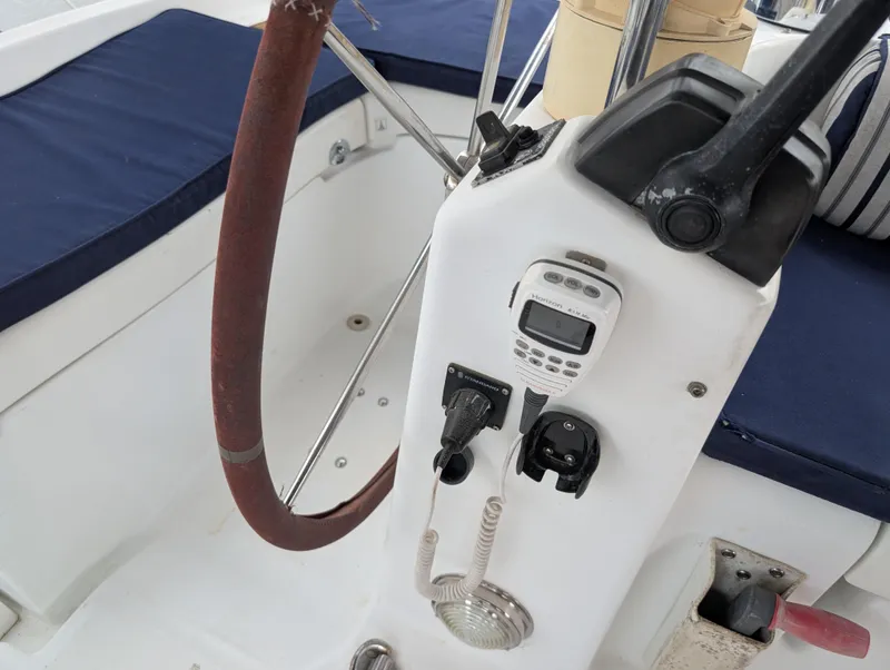 Slide: The Image of Cockpit of 2003 Beneteau Oceanis 473 sailboat with navigation equipment and steering wheel. - 36