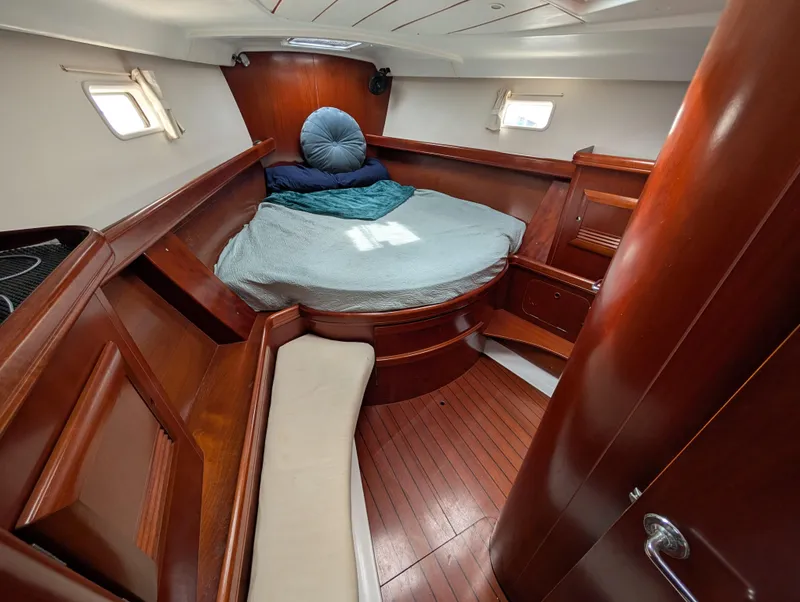 Slide: The Image of Luxurious cabin interior of 2003 Beneteau Oceanis 473 sailboat with wooden finish. - 8