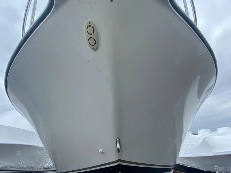 Slide: The Image of 2007 Pursuit 335 Offshore boat hull, close-up view from the front. - 4