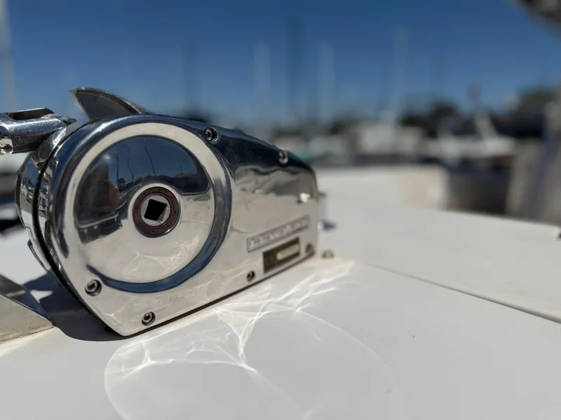 Slide: The Image of Close-up of a 2005 Grady-White Bimini 306 boat winch in sunlight. - 6