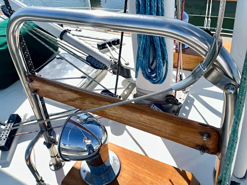 Slide: The Image of Cockpit of 1999 Pacific Seacraft 40 Voyagemaker sailboat with navigation instruments and steering wheel. - 14