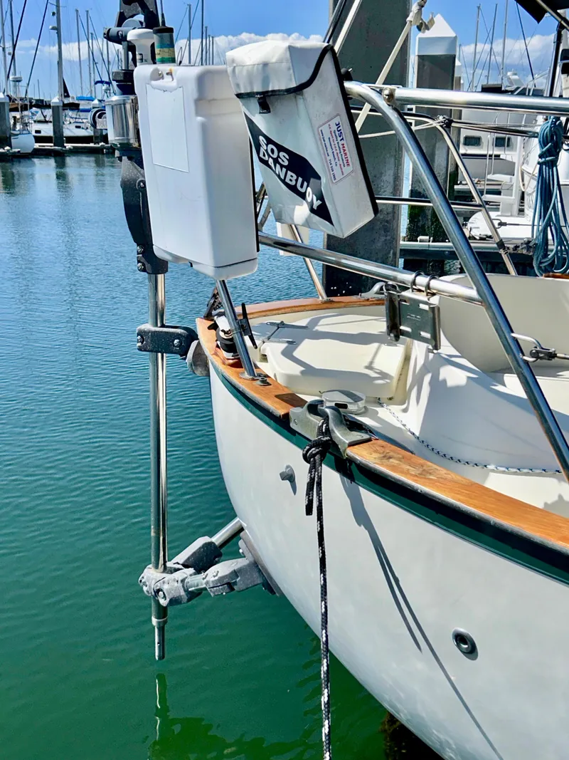 Slide: The Image of 1999 Pacific Seacraft 40 Voyagemaker sailboat docked, showcasing deck and rigging. - 7