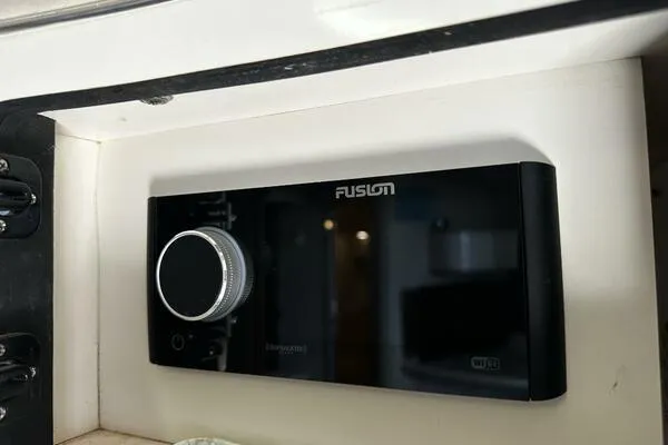 Slide: The Image of Fusion stereo system on 1996 Sea Ray 400 Express Cruiser dashboard. - 21