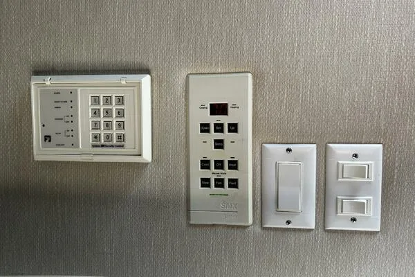 Slide: The Image of Control panel and switches on a 1996 Sea Ray 400 Express Cruiser yacht. - 22