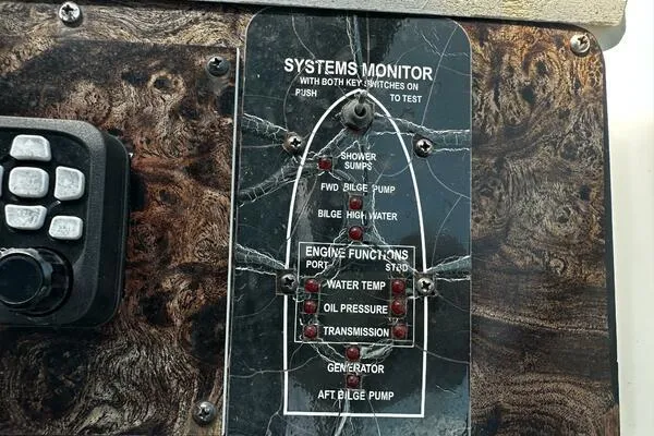 Slide: The Image of Control panel of a 1996 Sea Ray 400 Express Cruiser systems monitor. - 28