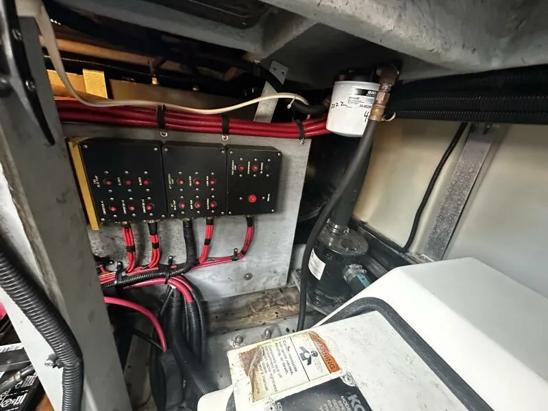 Slide: The Image of Electrical panel and wiring inside a 1996 Sea Ray 400 Express Cruiser boat. - 35