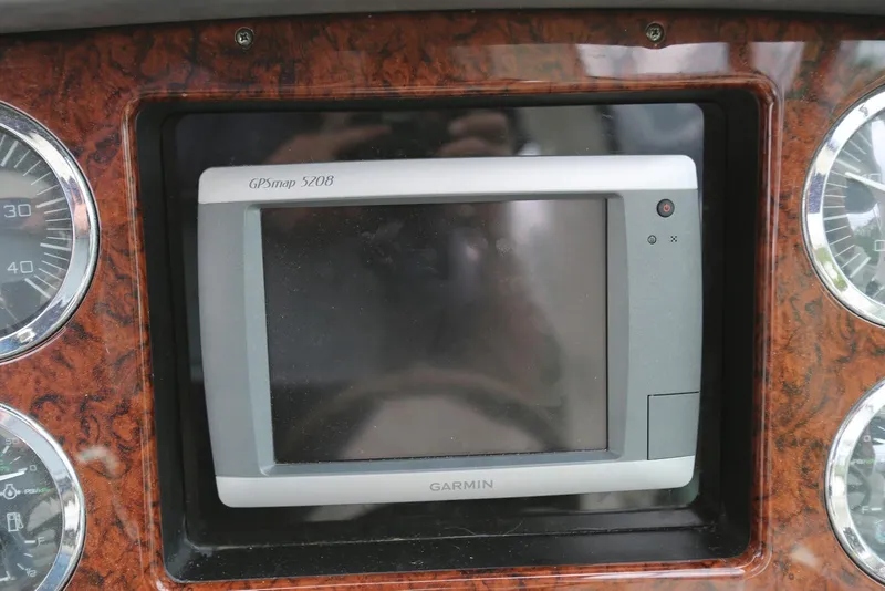 Slide: The Image of Garmin GPSmap 5208 on 2003 Sea Ray 420 Sundancer dashboard with wood finish. - 28