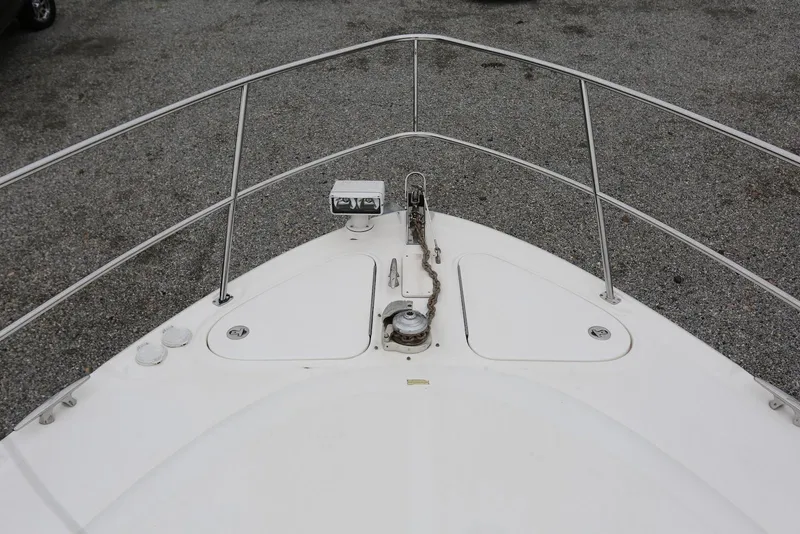 Slide: The Image of Bow of 2003 Sea Ray 420 Sundancer with anchor and railings. - 37