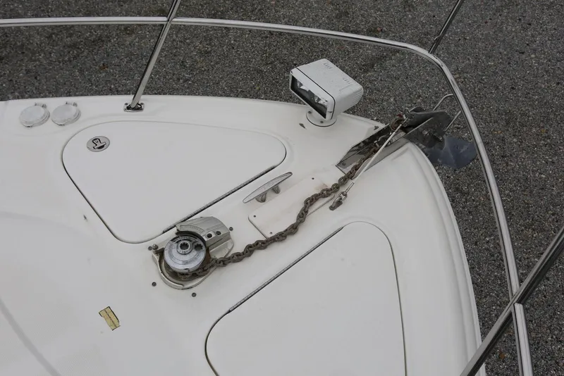 Slide: The Image of Bow of 2003 Sea Ray 420 Sundancer with anchor and chain mechanism. - 38