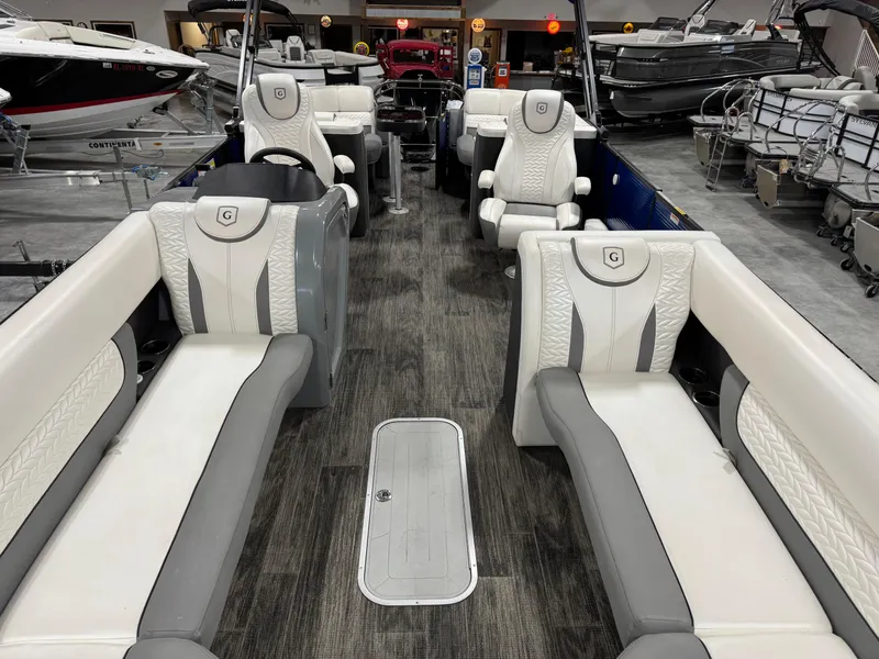 Slide: The Image of 2020 Godfrey 250 Monaco boat interior with luxurious seating and modern design. - 11