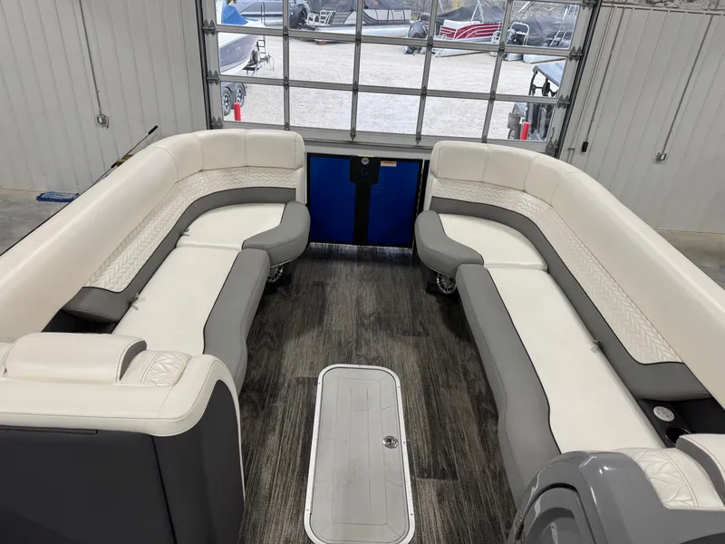 Slide: The Image of Interior of 2020 Godfrey 250 Monaco pontoon boat with spacious seating and modern design. - 13