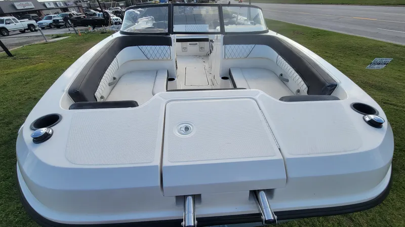 Slide: The Image of 2021 Bayliner DX 2200 boat interior with spacious seating and modern design. - 8