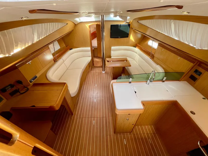 Slide: The Image of Luxurious interior of 2008 Jeanneau Sun Odyssey 42 DS yacht with elegant wood finish. - 14