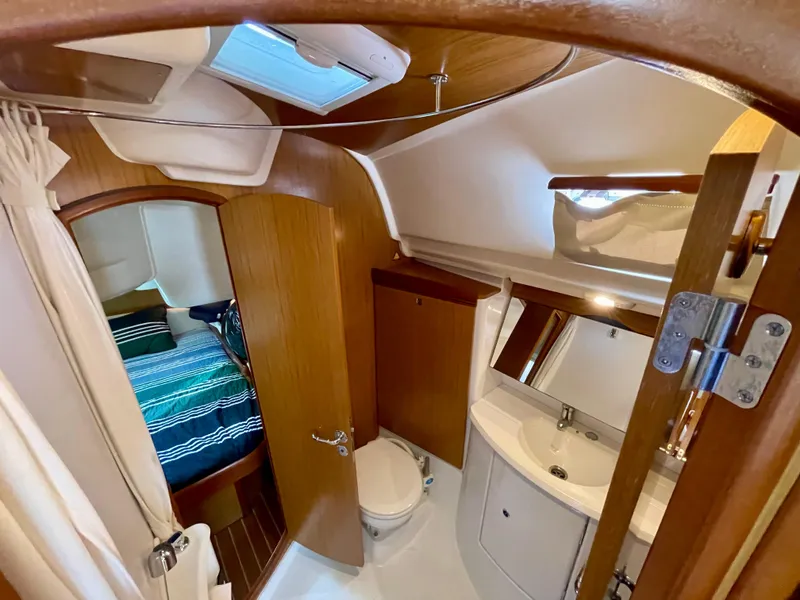 Slide: The Image of Interior of 2008 Jeanneau Sun Odyssey 42 DS yacht, featuring bathroom and cabin. - 25