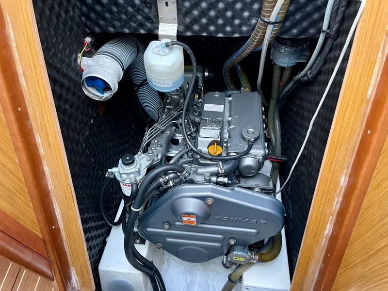 Slide: The Image of Engine compartment of 2008 Jeanneau Sun Odyssey 42 DS sailboat, featuring Yanmar engine. - 26