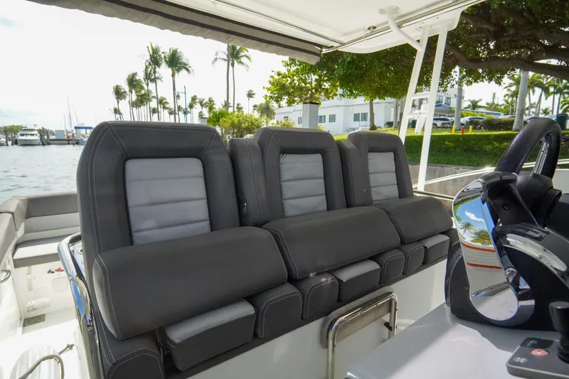 Slide: The Image of 2021 Jeanneau Leader 10.5 WA boat interior with sleek seating and modern design. - 22