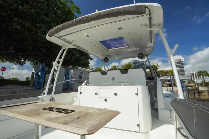 Slide: The Image of 2021 Jeanneau Leader 10.5 WA boat with spacious deck and modern amenities. - 35