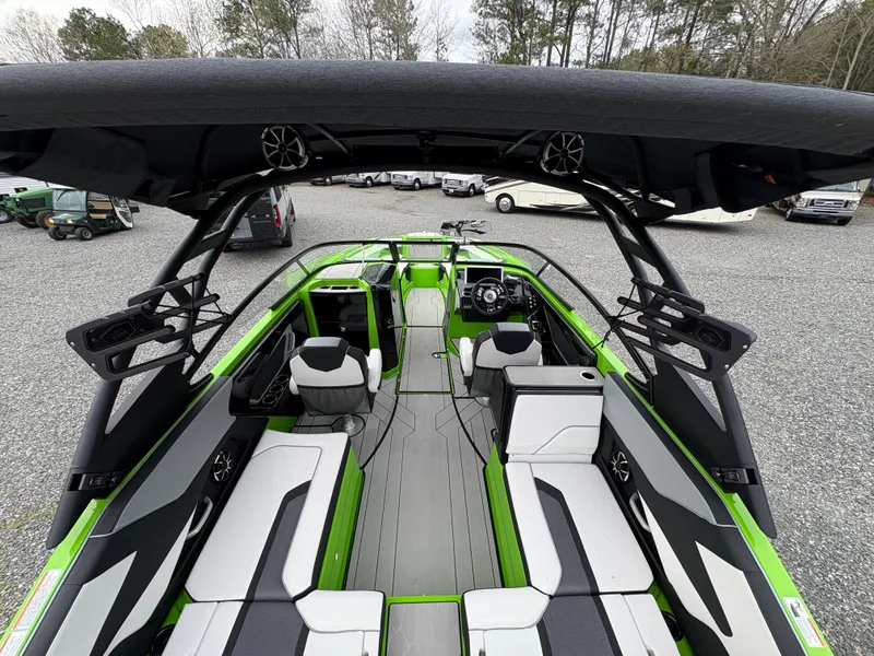 Slide: The Image of 2022 Yamaha Boats 255XD interior with sleek seating and modern design. - 13