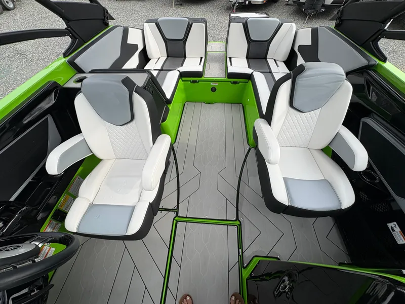 Slide: The Image of 2022 Yamaha Boats 255XD interior with modern seating and sleek design. - 35
