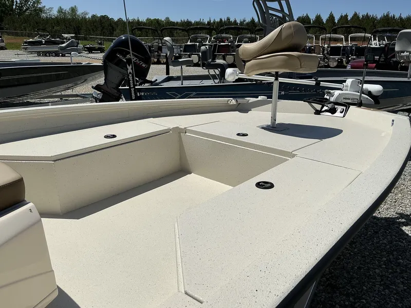 Slide: The Image of 2025 Xpress Hyper-Lift Series H22B boat with Terrova motor, featuring spacious deck and seating. - 3