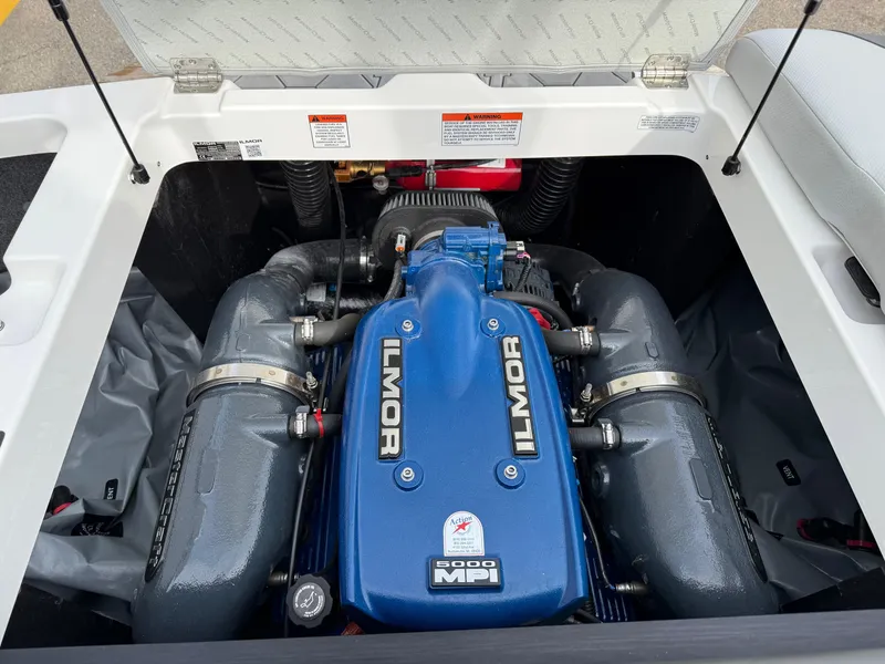 Slide: The Image of 2019 MasterCraft NXT22 engine compartment featuring Ilmor 5000 MPI engine. - 17