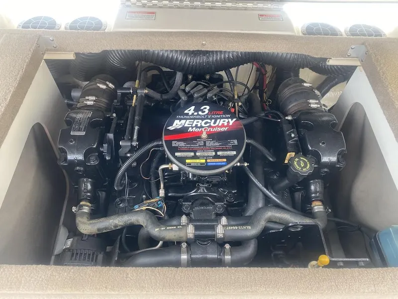 Slide: The Image of Engine compartment of a 2003 Sea Ray 182 SRX Bow Rider with Mercury MerCruiser 4.3L engine. - 16
