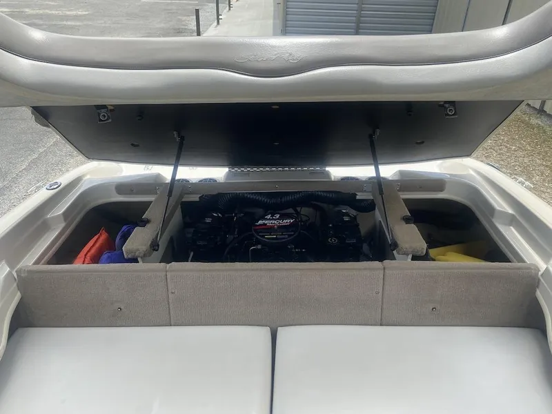 Slide: The Image of Open engine compartment of 2003 Sea Ray 182 SRX Bow Rider boat. - 17