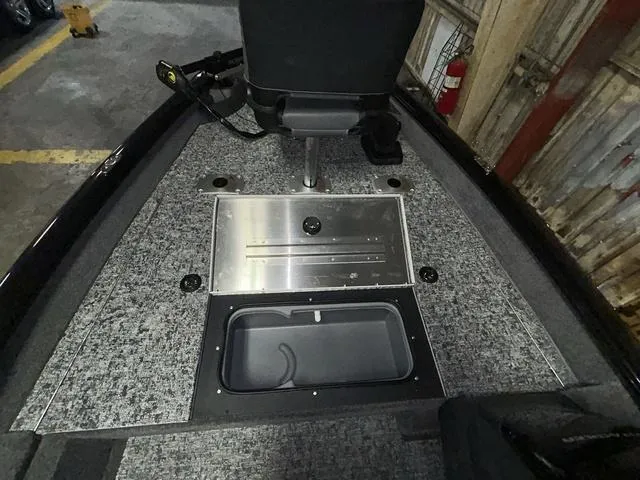 Slide: The Image of 2025 Tracker PT175TF boat interior with storage compartments and seating. - 7