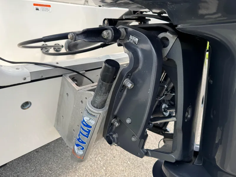 Slide: The Image of Close-up of a 2016 Wellcraft 241 boat motor mount with Atlas hydraulic jack plate. - 12