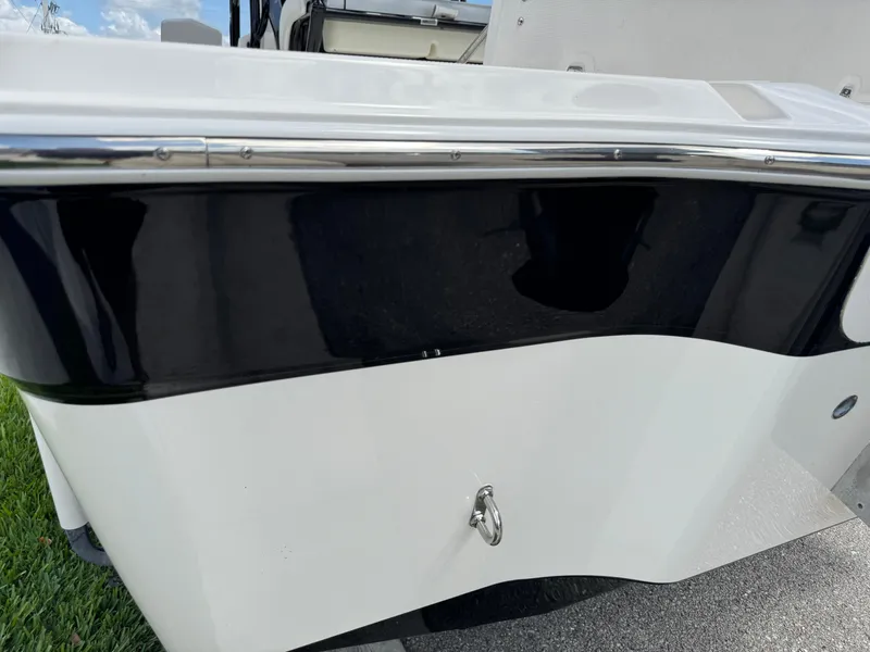 Slide: The Image of 2016 Wellcraft 241 boat, black and white exterior detail, close-up view. - 14