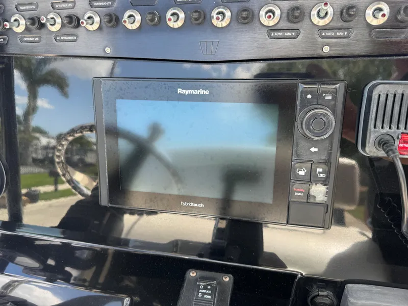 Slide: The Image of Control panel of a 2016 Wellcraft 241 boat with Raymarine display. - 27
