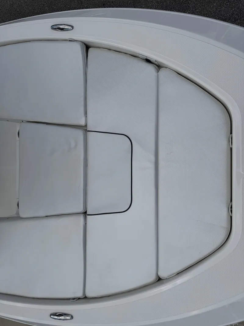 Slide: The Image of 2016 Wellcraft 241 boat bow with cushioned seating, top view. - 44