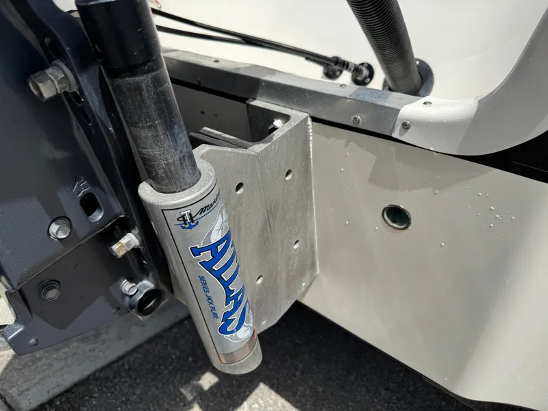 Slide: The Image of Close-up of a 2016 Wellcraft 241 boat component with hydraulic system detail. - 6