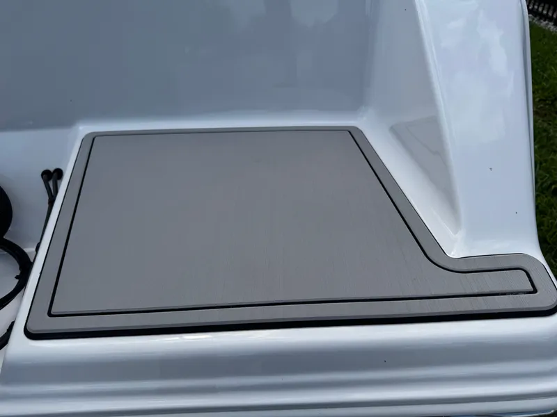 Slide: The Image of 2023 Sportsman Open 212 Center Console deck detail, featuring sleek design and durable materials. - 13