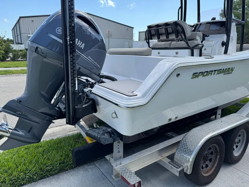 Slide: The Image of 2023 Sportsman Open 212 Center Console boat on trailer with Yamaha outboard motor. - 15