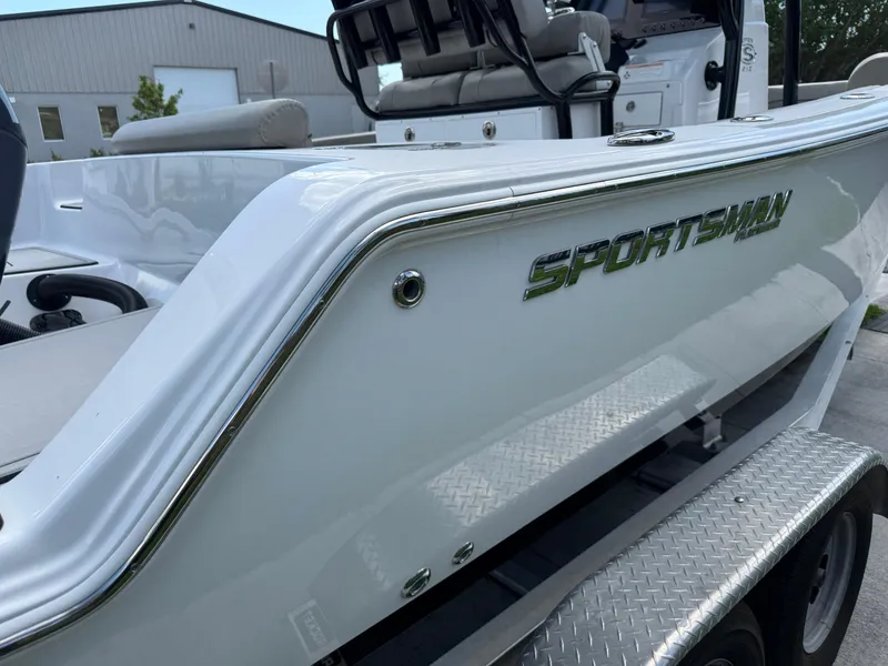 Slide: The Image of 2023 Sportsman Open 212 Center Console boat on trailer, side view. - 16