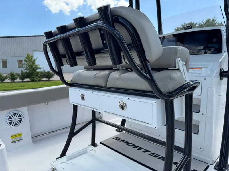 Slide: The Image of 2023 Sportsman Open 212 Center Console boat interior with seating and storage. - 18