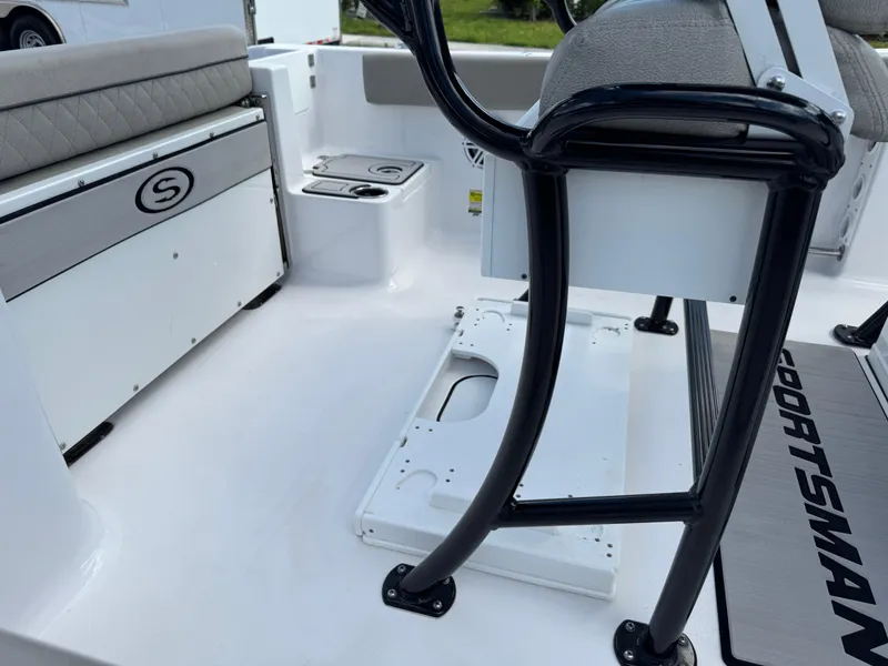 Slide: The Image of 2023 Sportsman Open 212 Center Console interior with seating and storage features. - 27