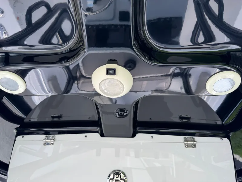 Slide: The Image of 2023 Sportsman Open 212 Center Console boat dashboard with speakers and controls. - 45