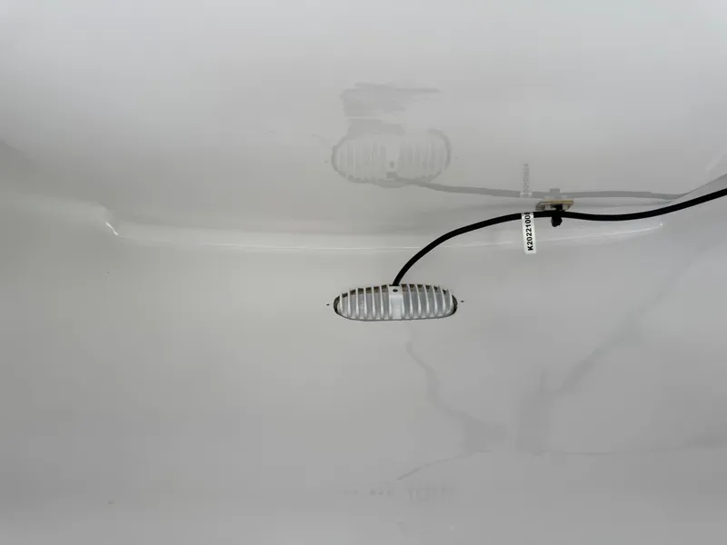 Slide: The Image of 2023 Sportsman Open 212 Center Console interior detail with wiring and fixture. - 48